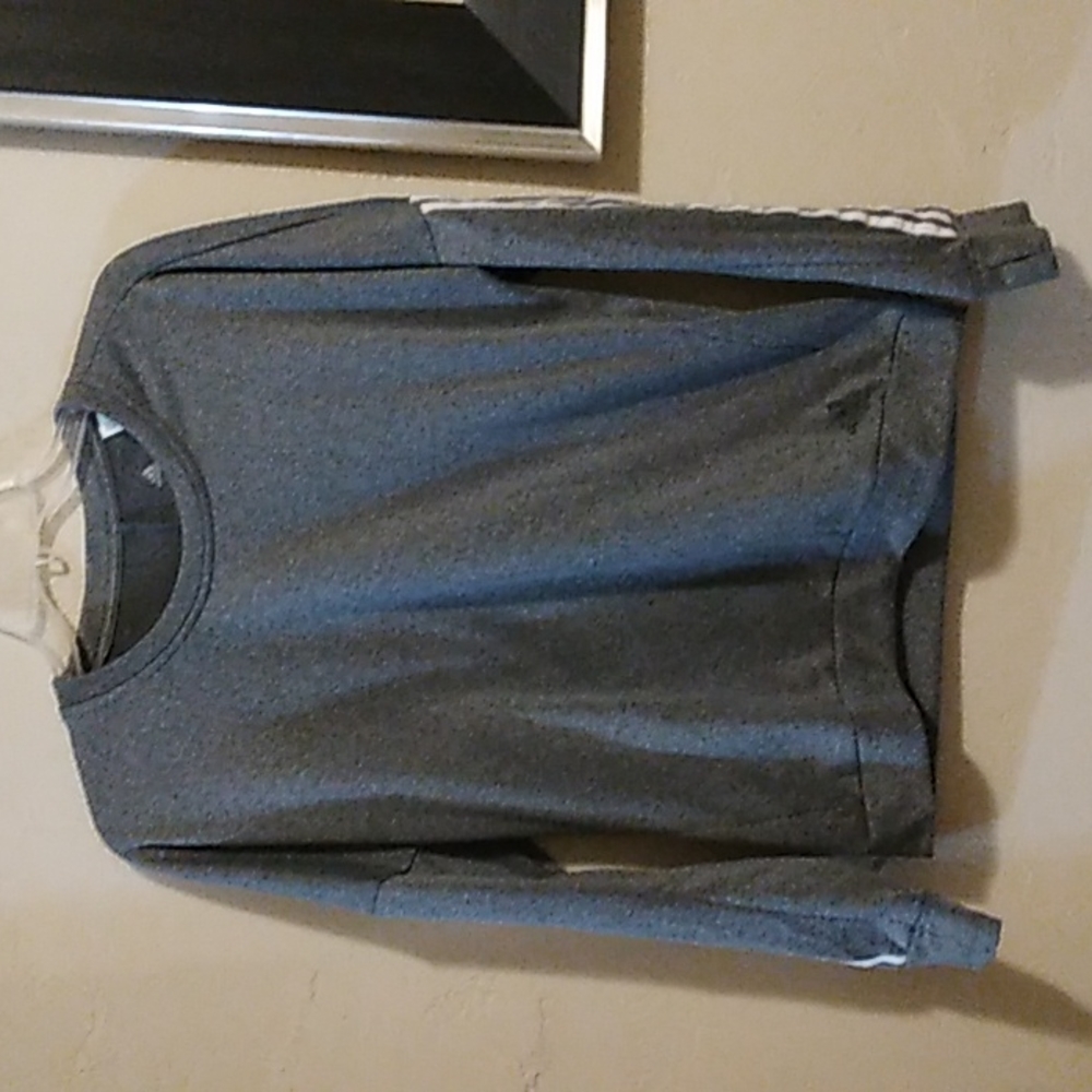 Size Medium womens running Adidas sweater. Like new